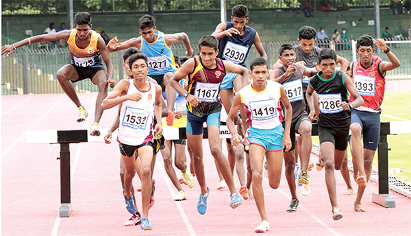 Action from Junior National Athletics Championships – The Island